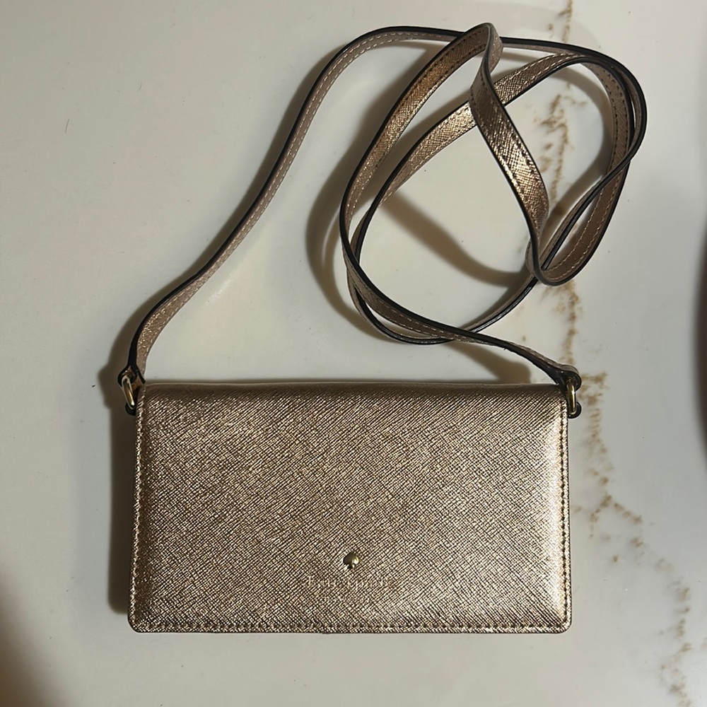 Beautiful rose gold wallet with crossbody strap and phone pouch